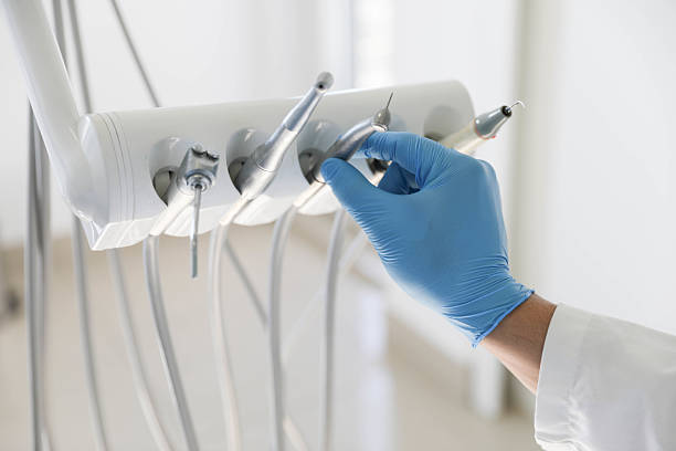 Professional Tooth Extraction technician working in West Columbia, TX